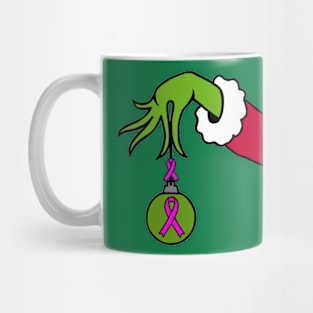 The Green Mean One holding a Awareness Ribbon Christmas ball (Pink) Mug